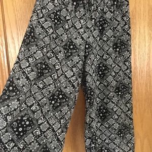 Pants hit below knee.